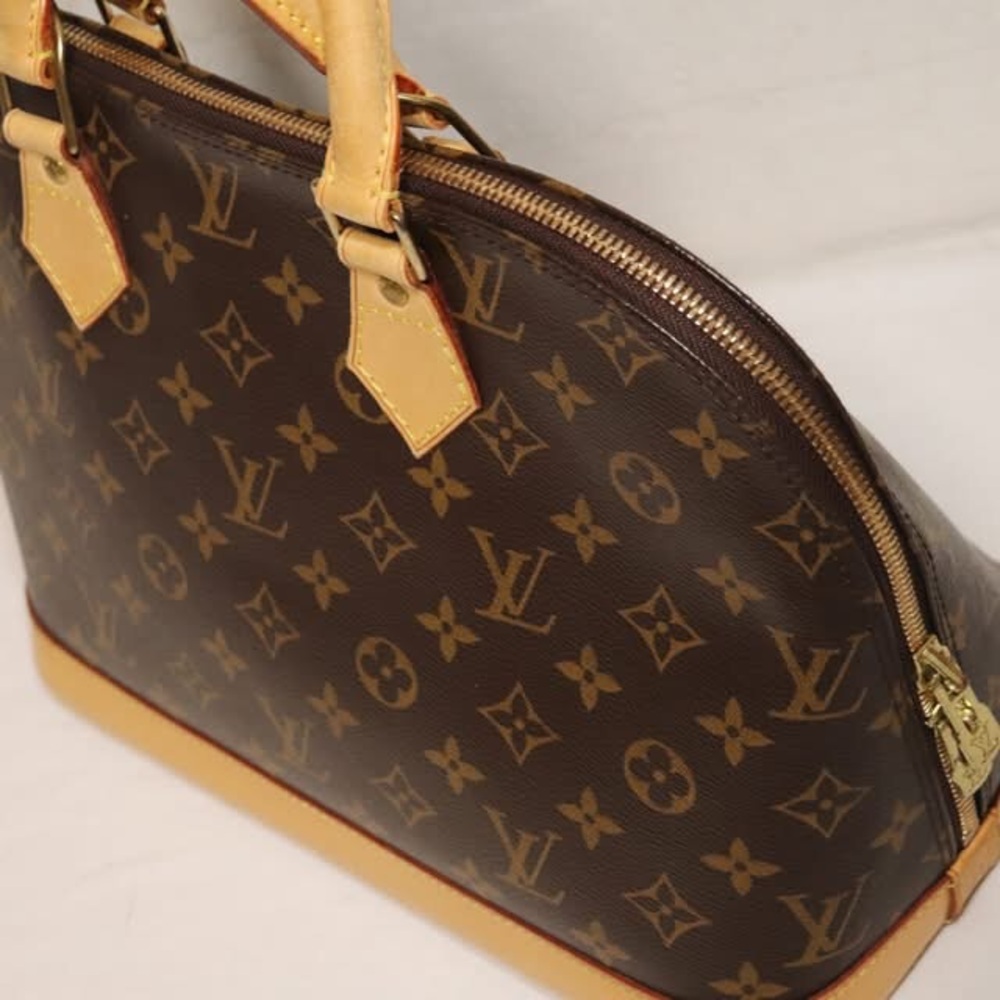 Authentic Monogram Alma